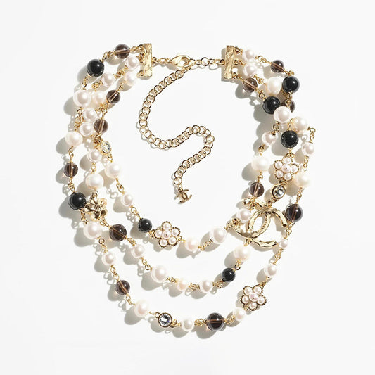 Chanel 24B Long Pearls 18K Gold Necklace